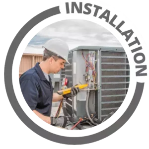 A man installing heating and cooling equipment. A man installing heating and cooling equipment.